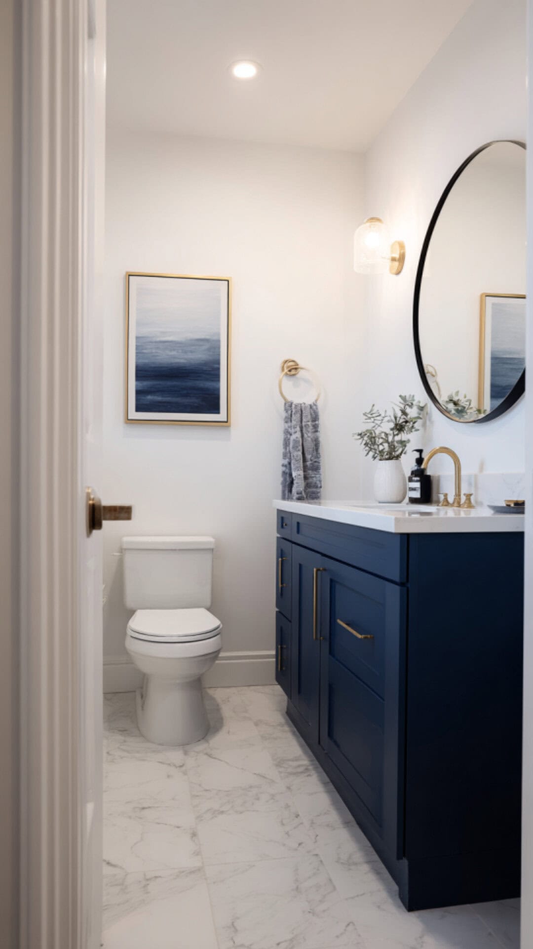 Half Bathroom with a Blue Vanity Pop