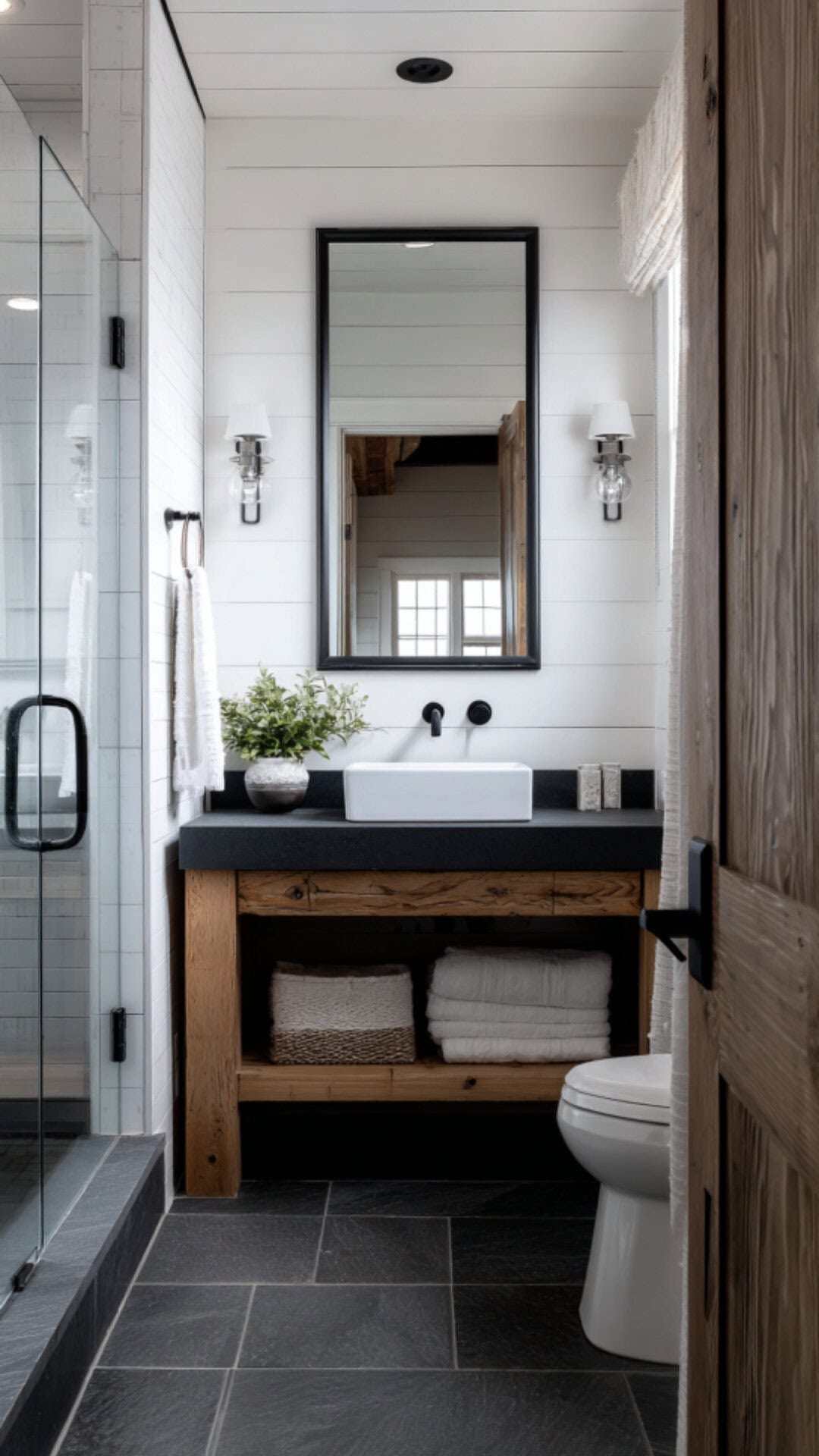 14. Black and White Country Bathroom with Bold Contrast