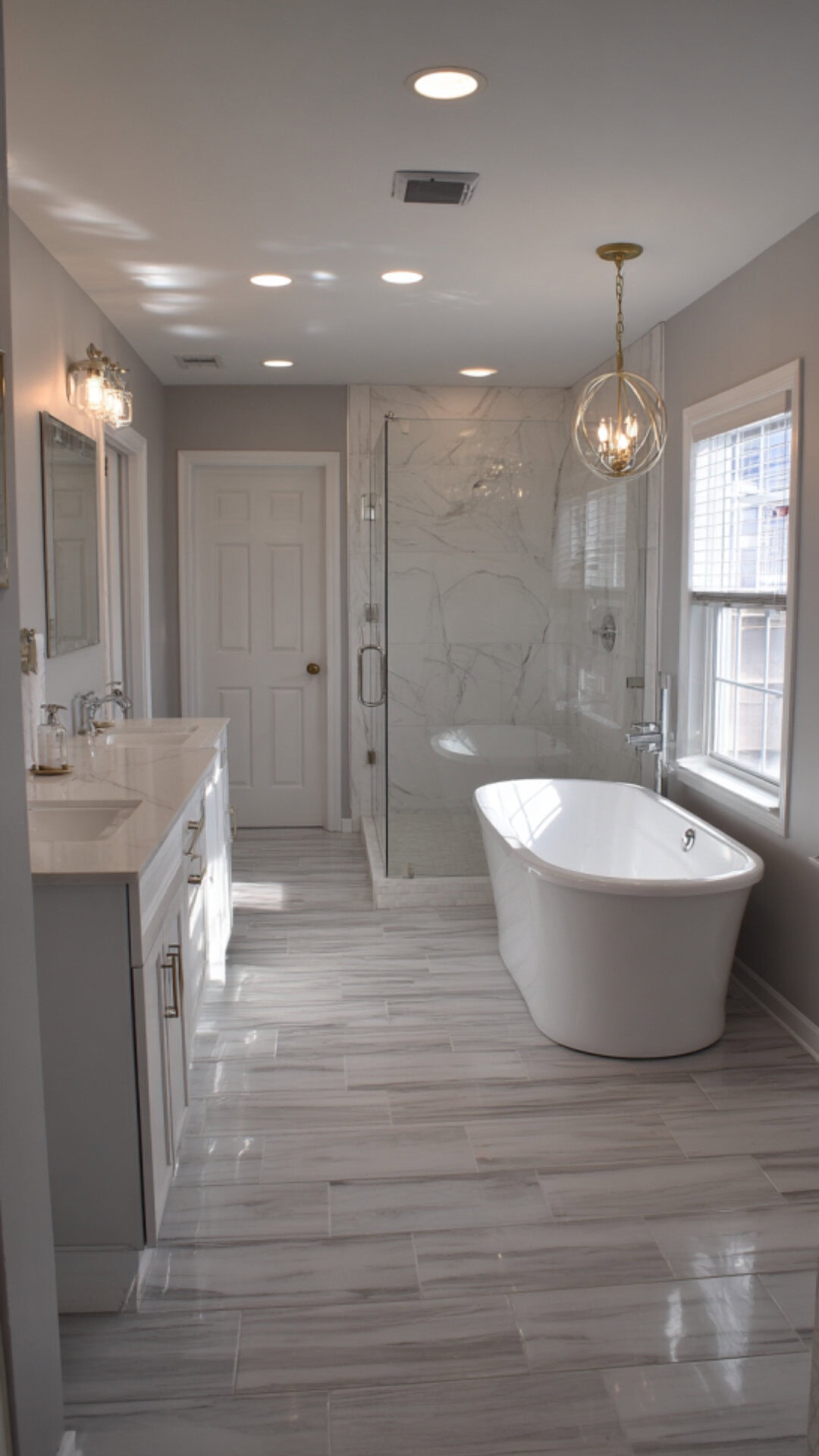 2. Bathroom with Vinyl Sheet Flooring for a Sleek Look