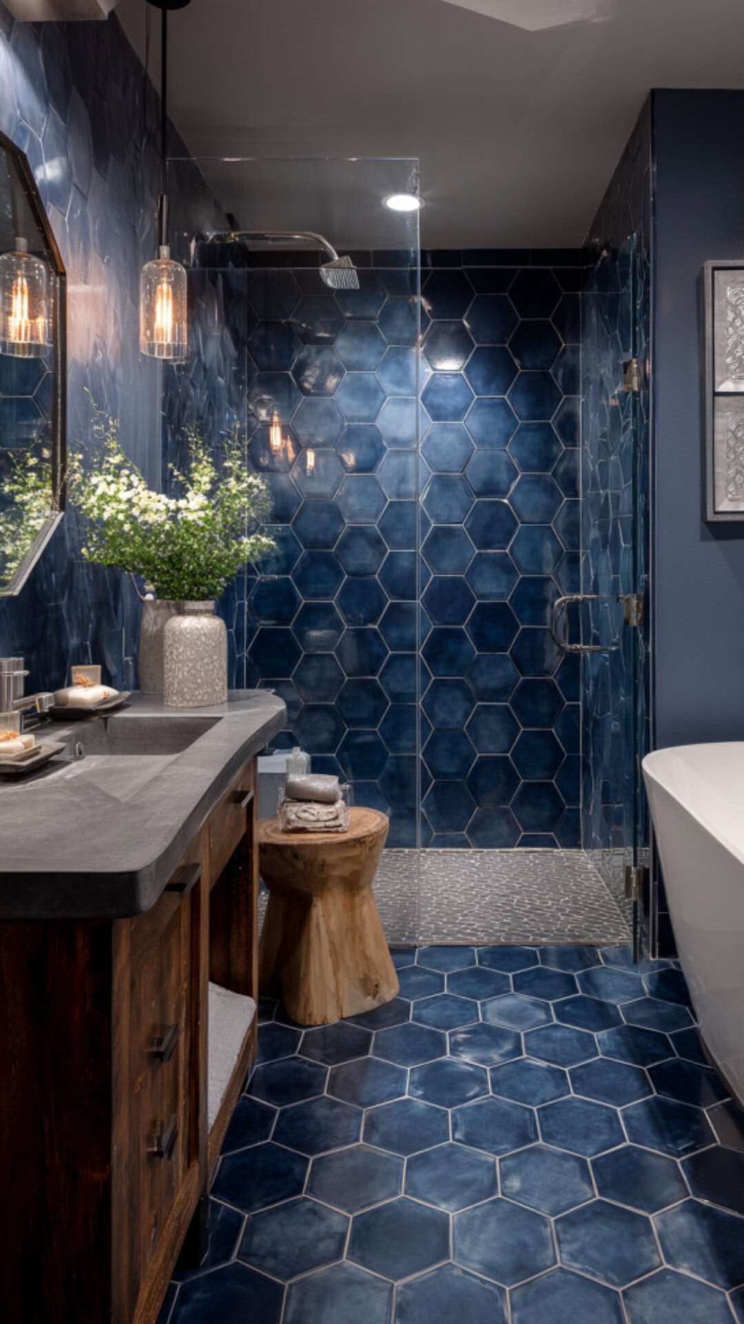 4. Navy Hexagon Tile Bathroom with Deep Rich Tones