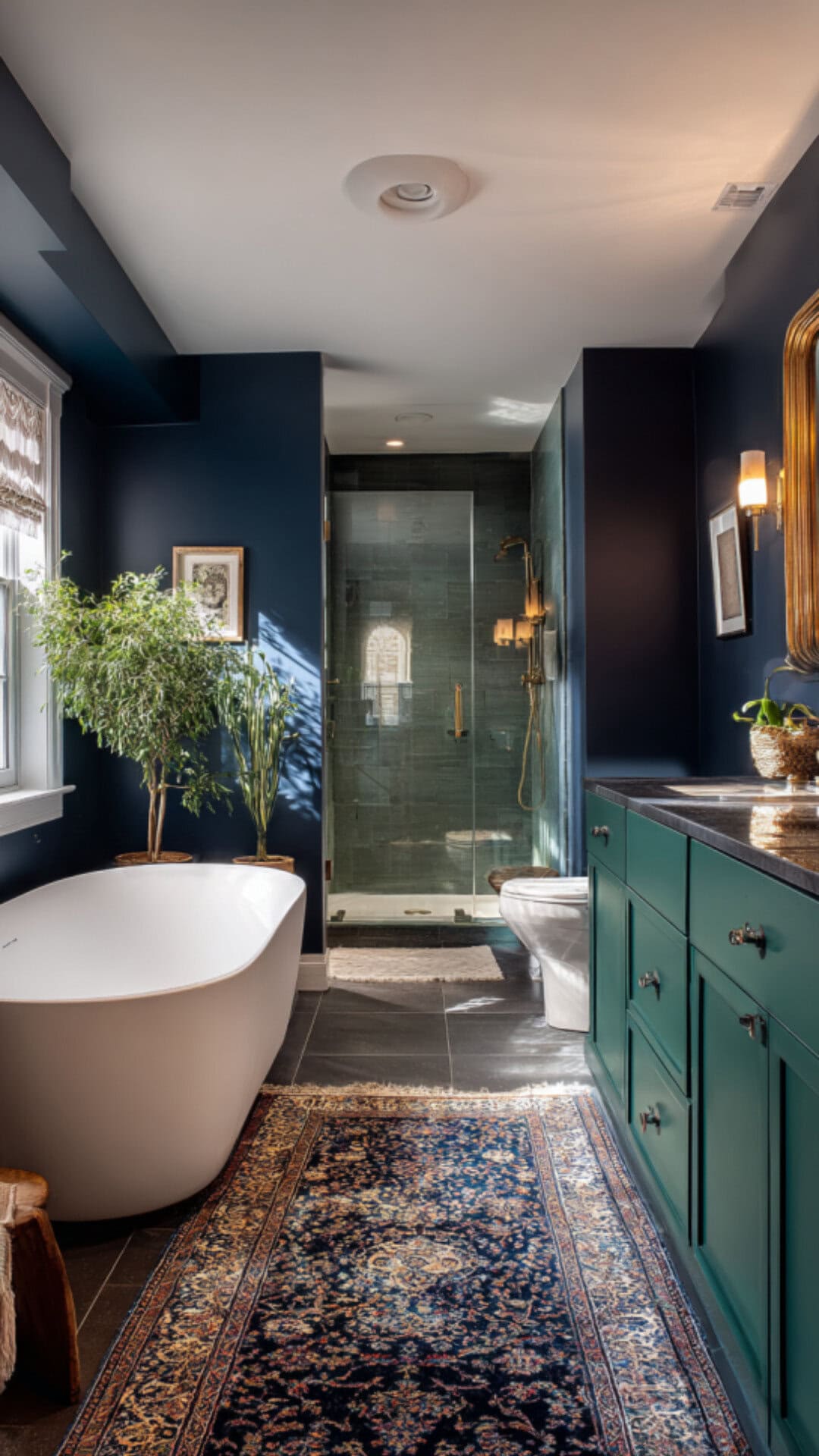 6. Navy Blue and Green Bathroom with Natural Energy