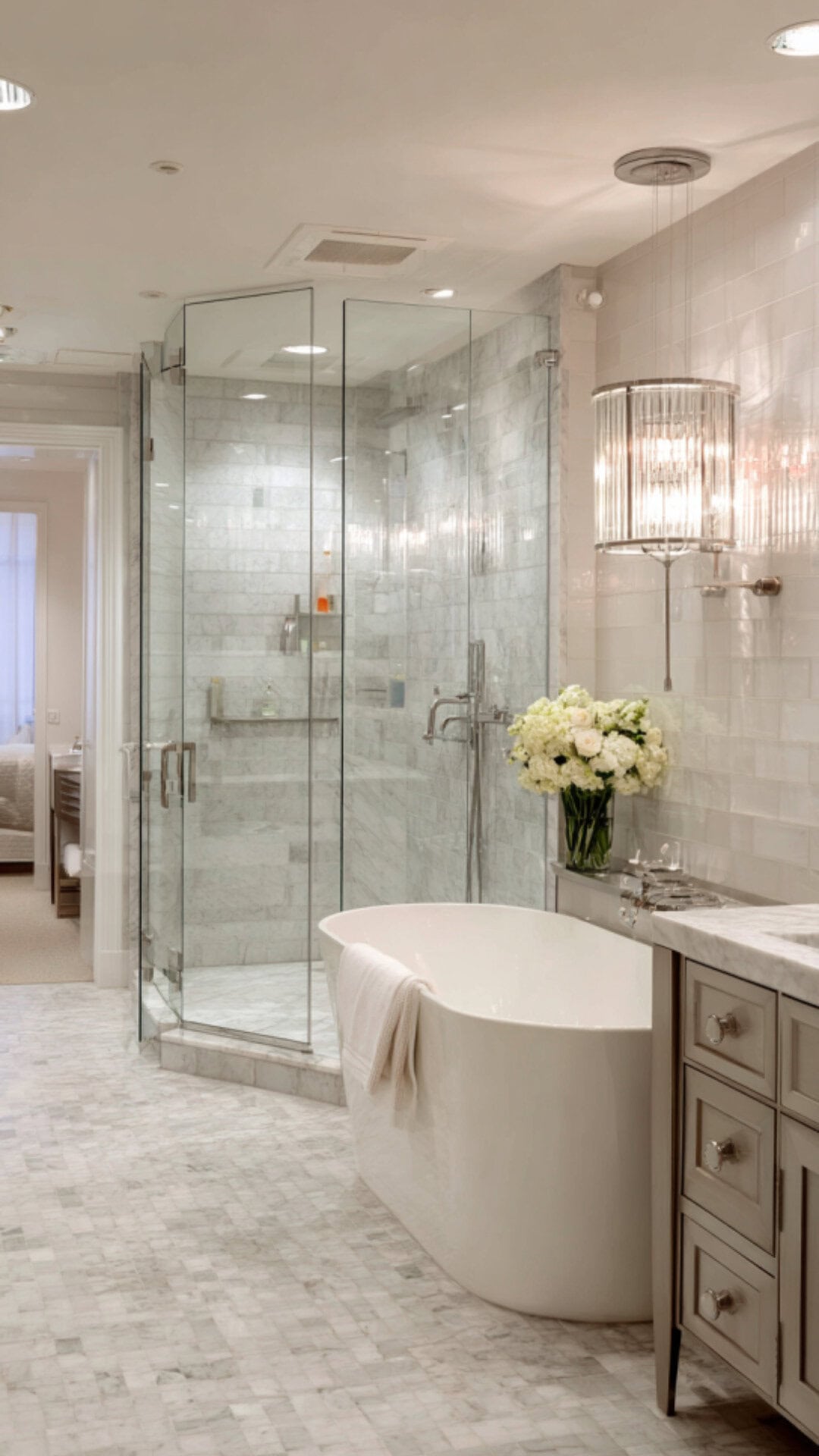 10. Silver Bathroom Sconces with Cool Sophistication