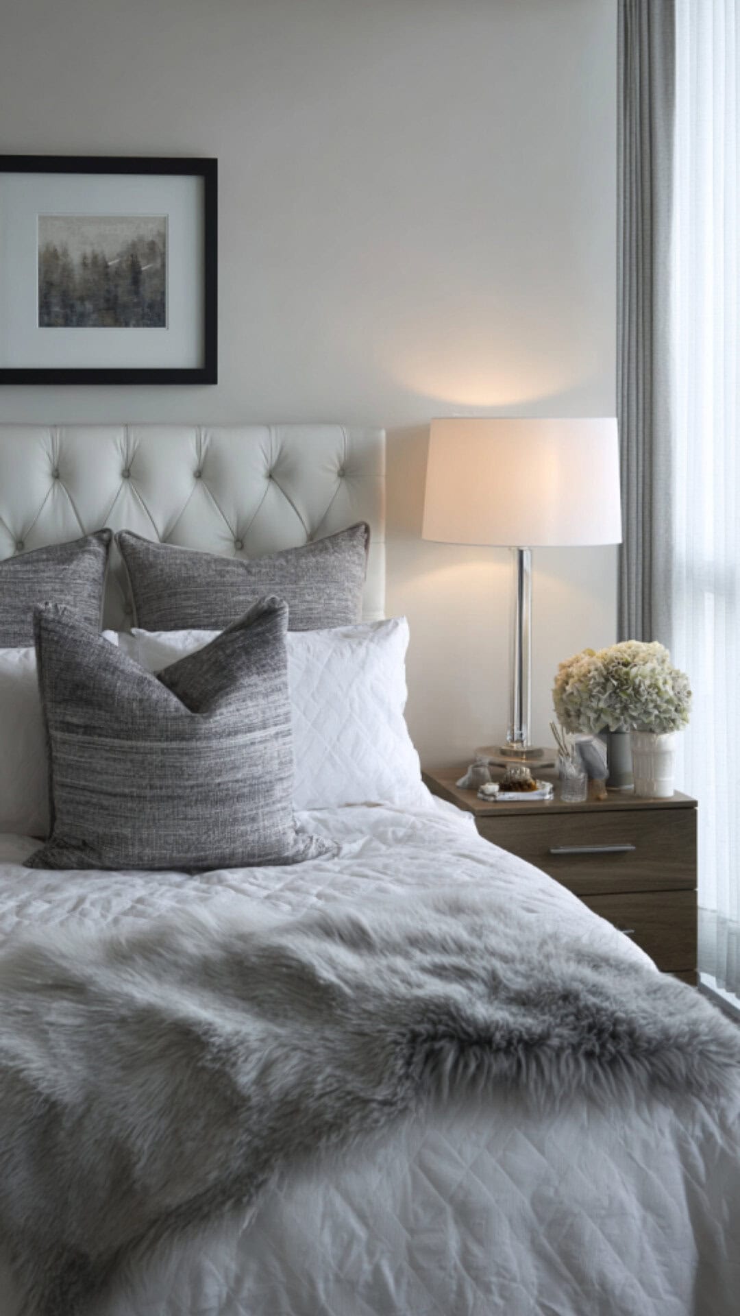2. White and Grey Bedroom with Subtle Balance